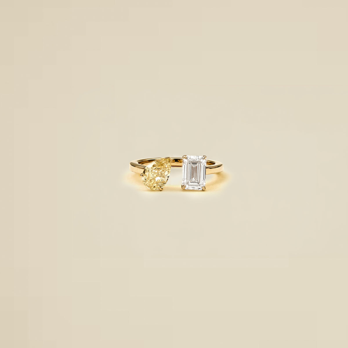 The Reserve 90 Pointer Fancy Yellow Pear and 1 Carat Emerald Cut Diamond Cuff Ring