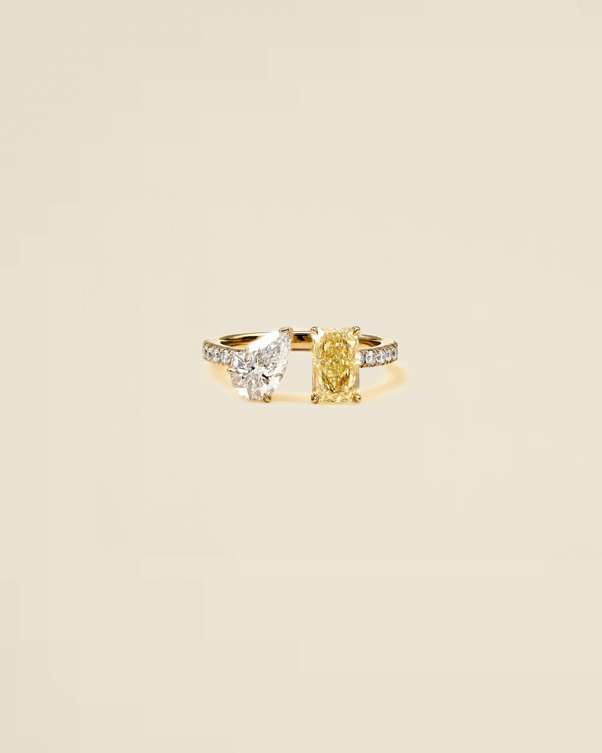 The Reserve 1 Carat Fancy Yellow Radiant and 70 Pointer Pear Cut Diamond Cuff Ring