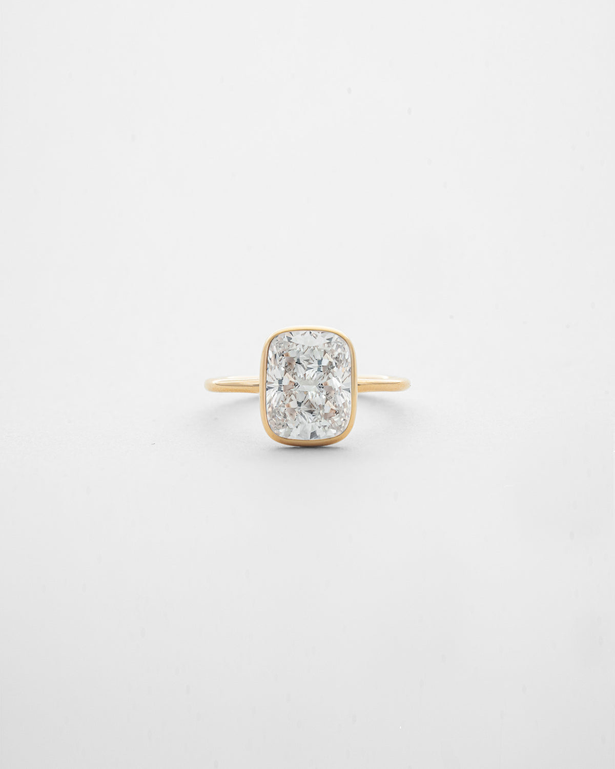 3 carats Cushion Cut Diamond with Bezel Solitaire Ring