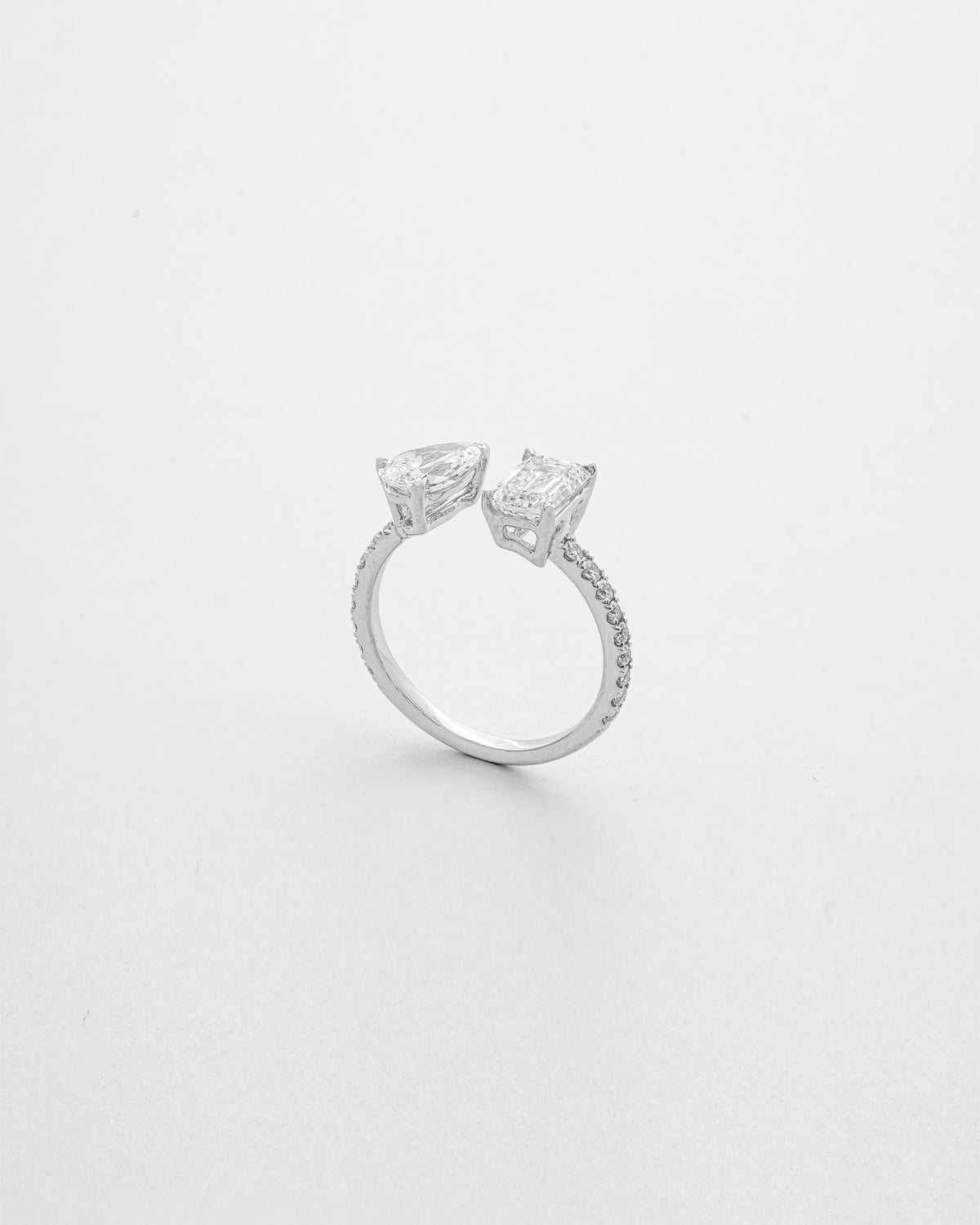 SD Signature 1 carat Emerald & 70 Pointer Pear Cut Diamond with Micro Pave Cuff Ring
