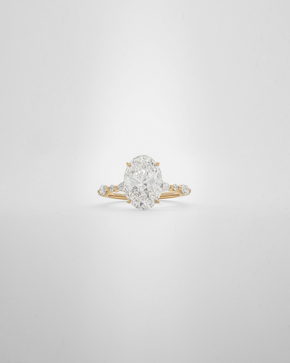 3 carats Oval Diamond with Marquise and Round Band