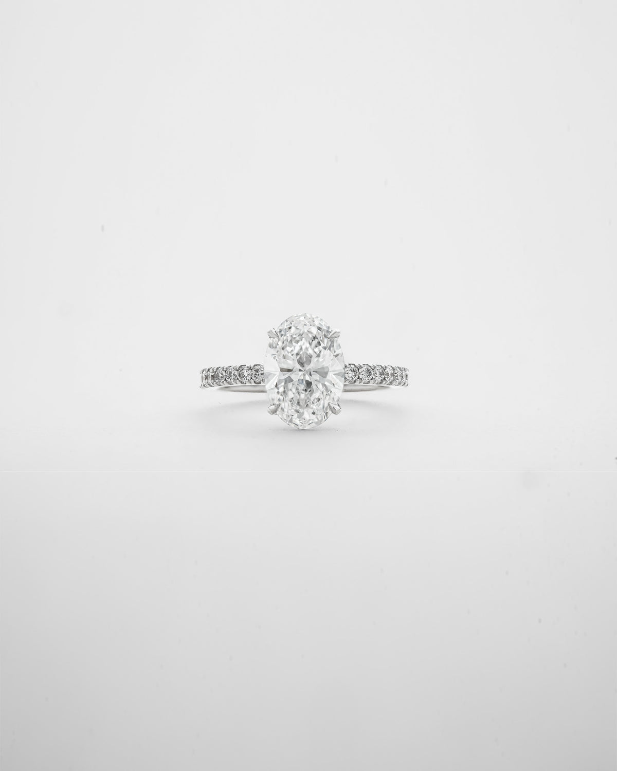 2 carats Oval Cut Diamond with Micro Pave Solitaire Ring