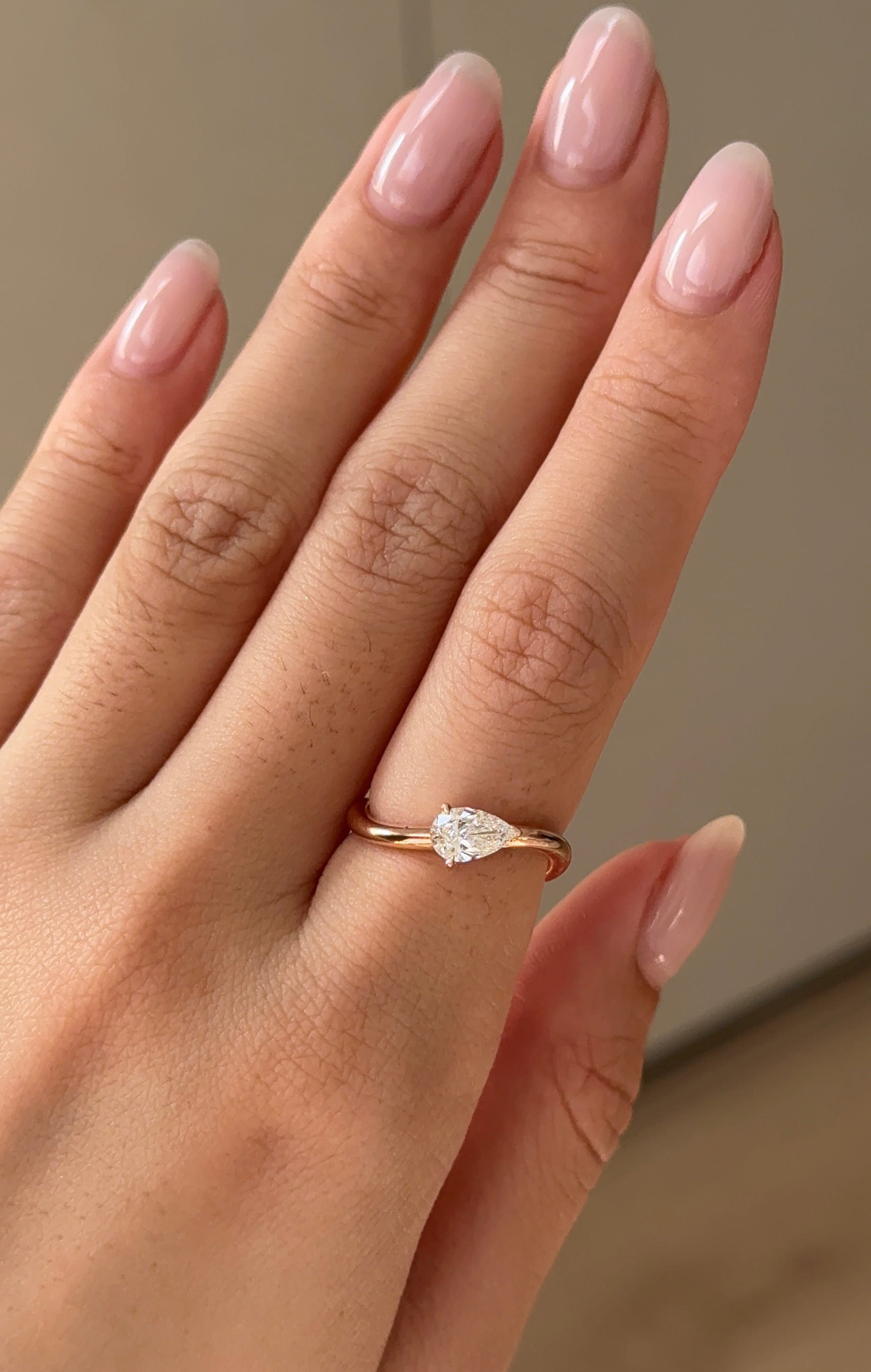 Half Carat Pear Cut Diamond Curvy Ring