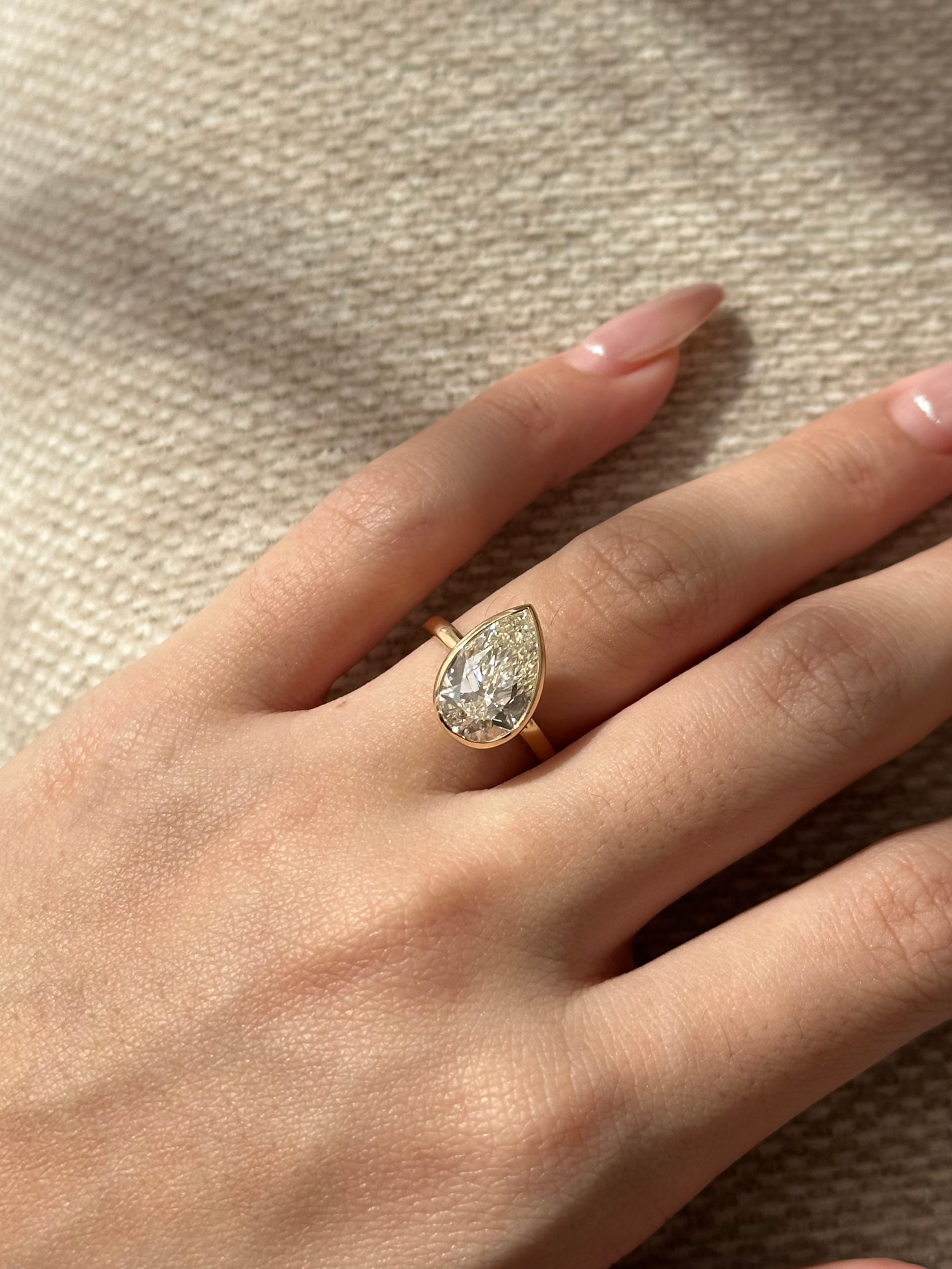 3 carats Pear Cut Diamond Bezel Set Diamond Ring