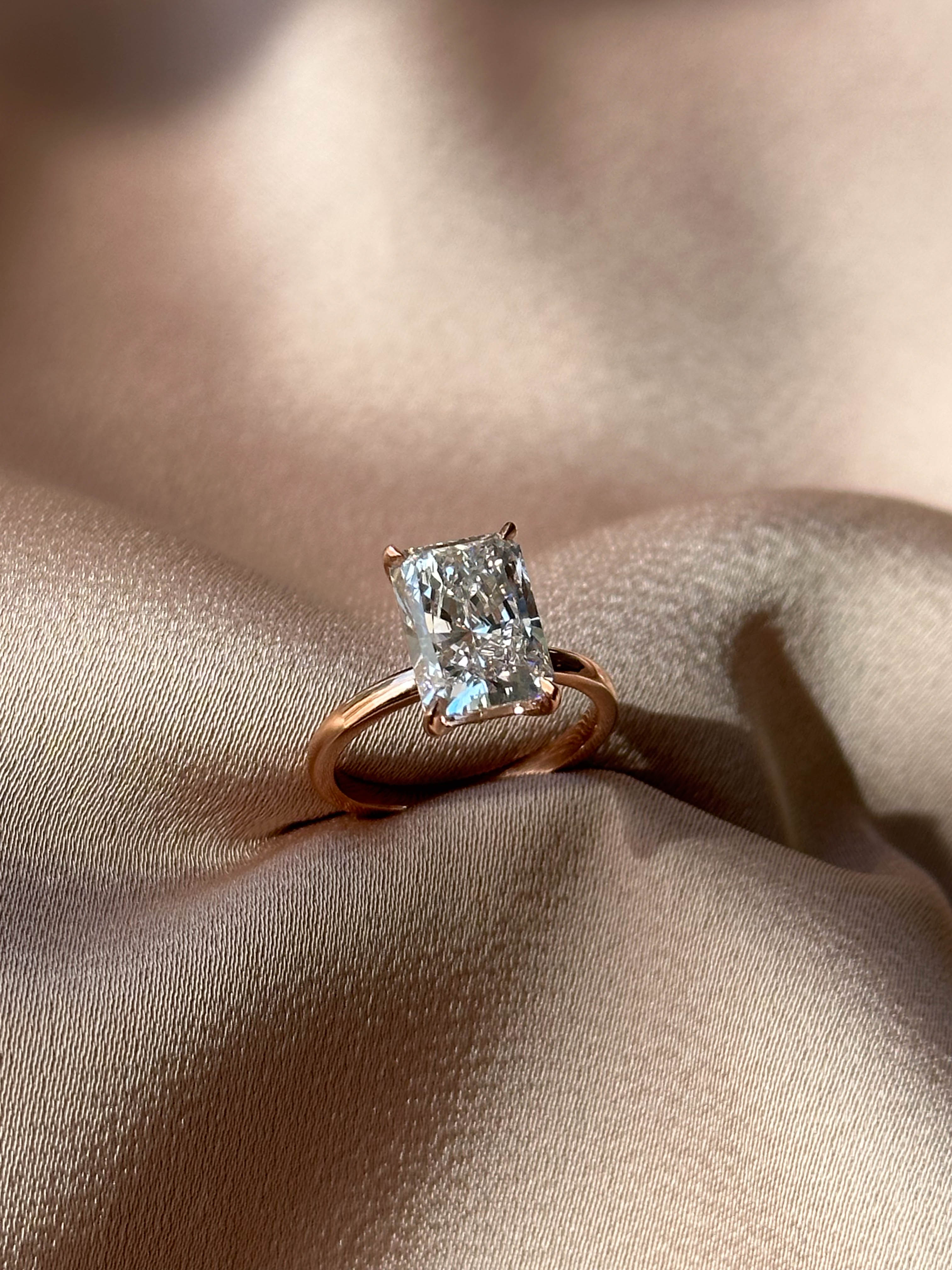 3.51 Carats Radiant Cut Solitaire Diamond Ring with Hidden Halo