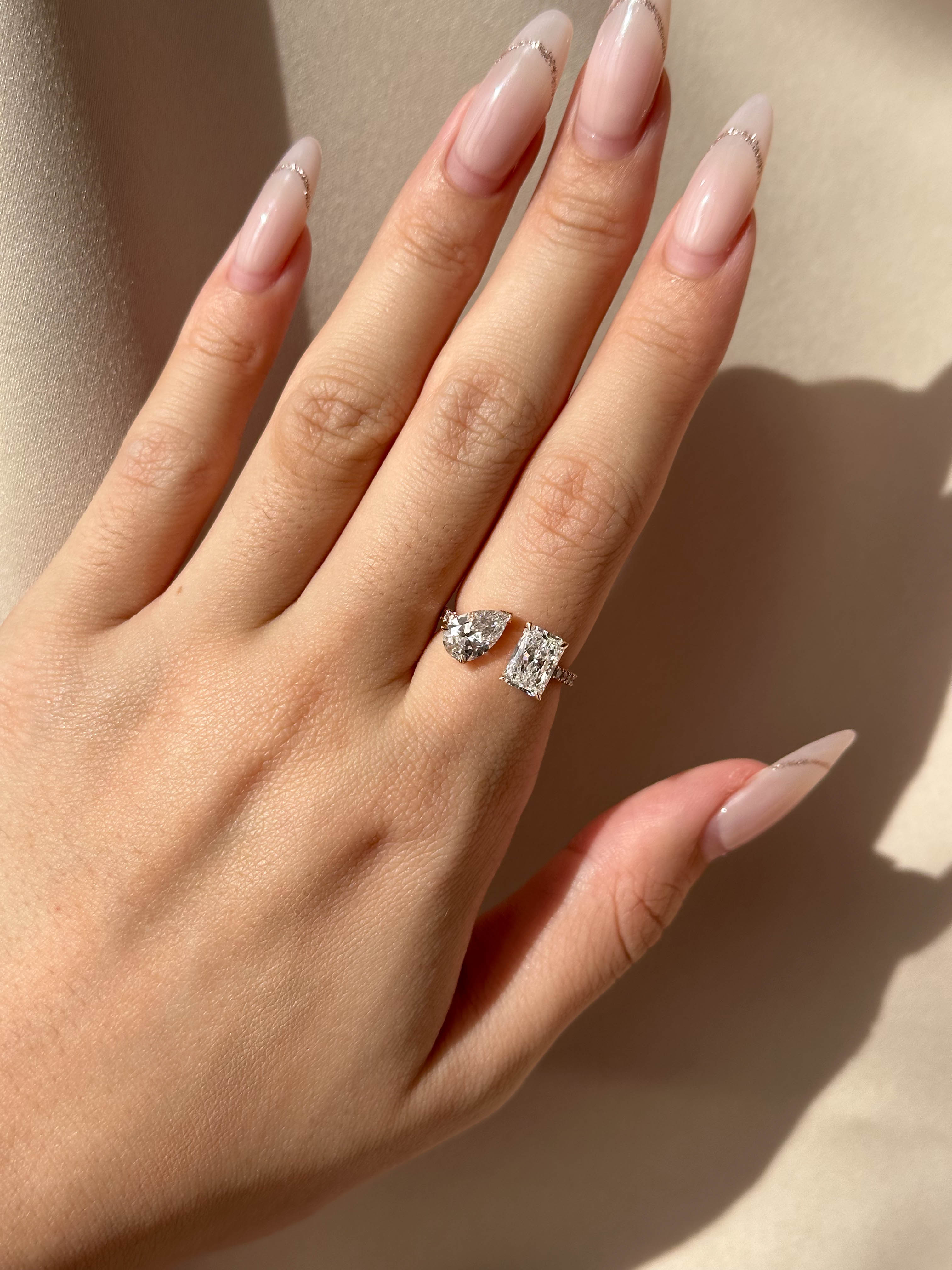 1 carat Pear & 1.4 carats Radiant Cuff Diamond Ring in Micro Pave Setting