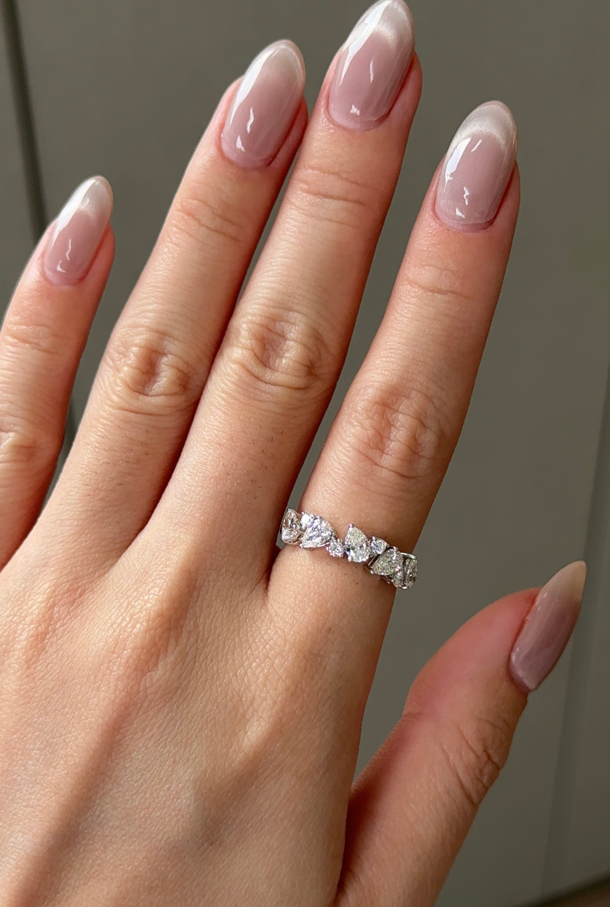 Pear and Round Cut Diamond Ring