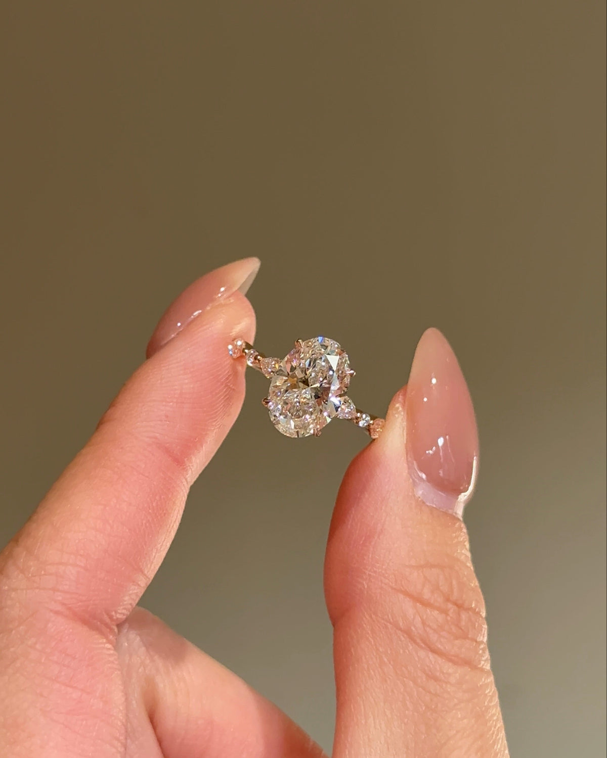 3 carats Oval Diamond with Marquise and Round Band