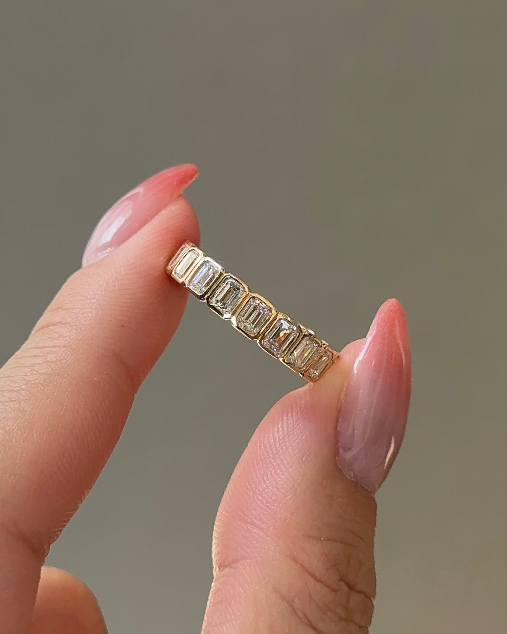 15 Pointer Emerald Cut Diamond Bezel Eternity Ring