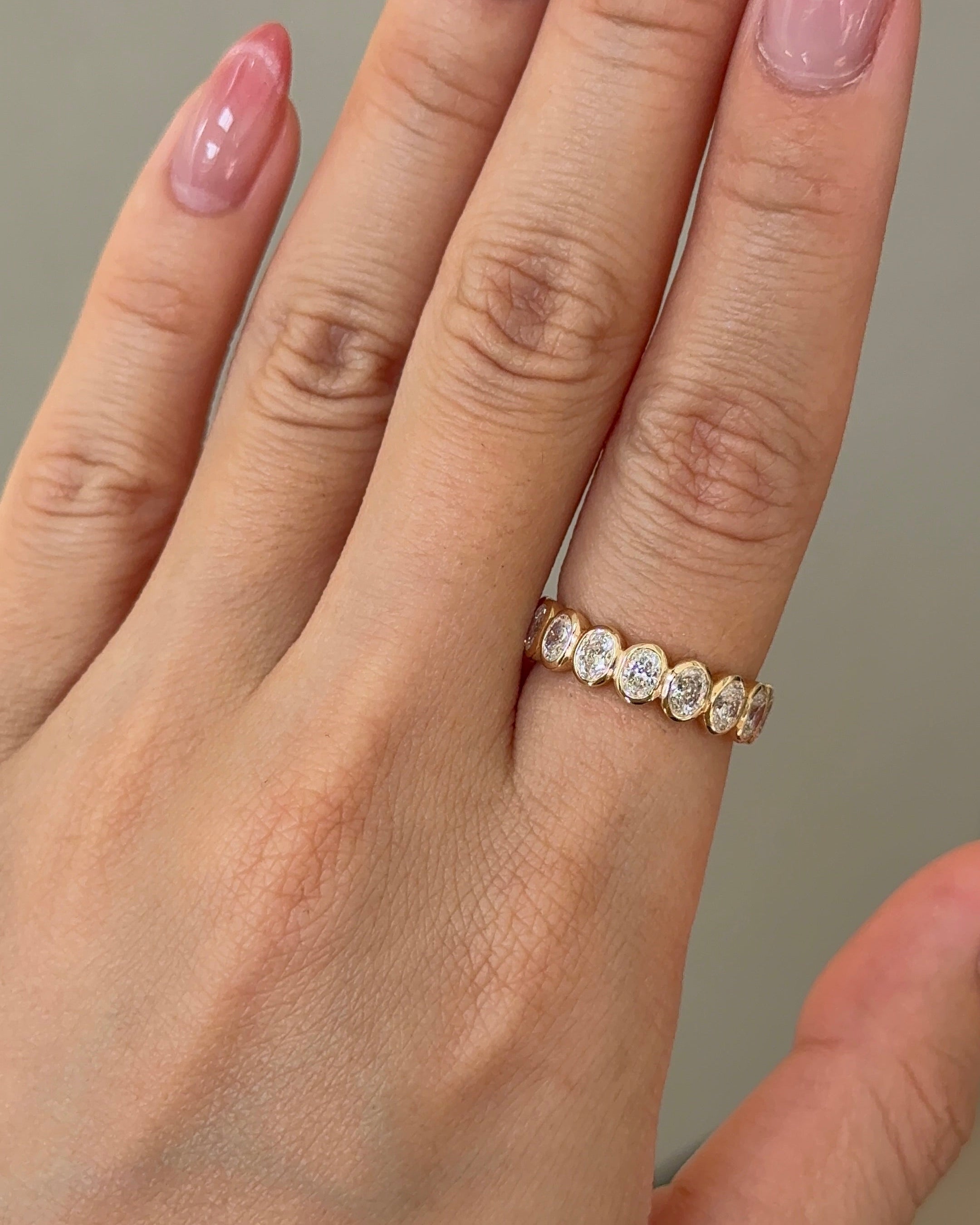 15 Pointer Oval Cut Diamond Bezel Half Eternity Ring