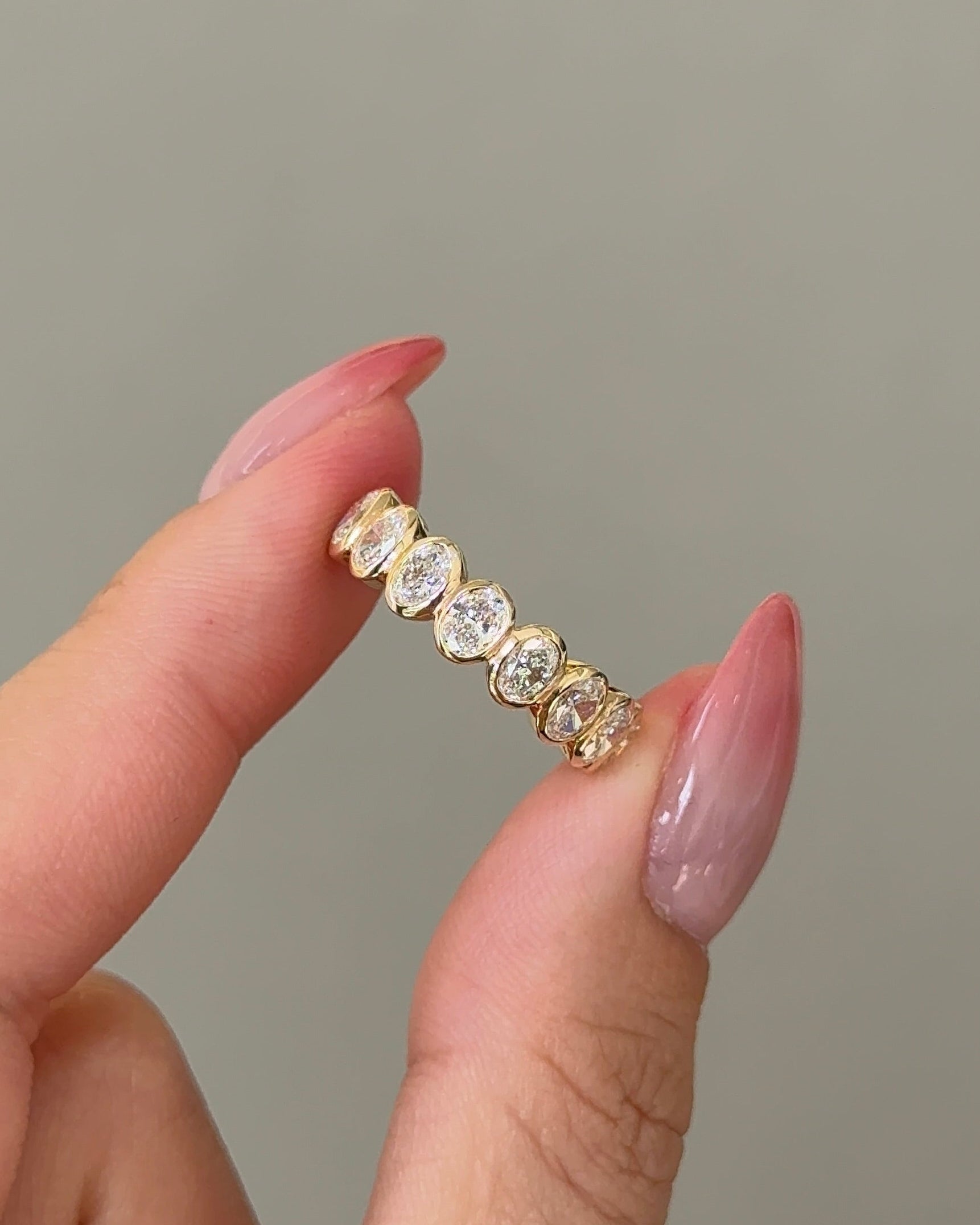 15 Pointer Oval Cut Diamond Bezel Half Eternity Ring