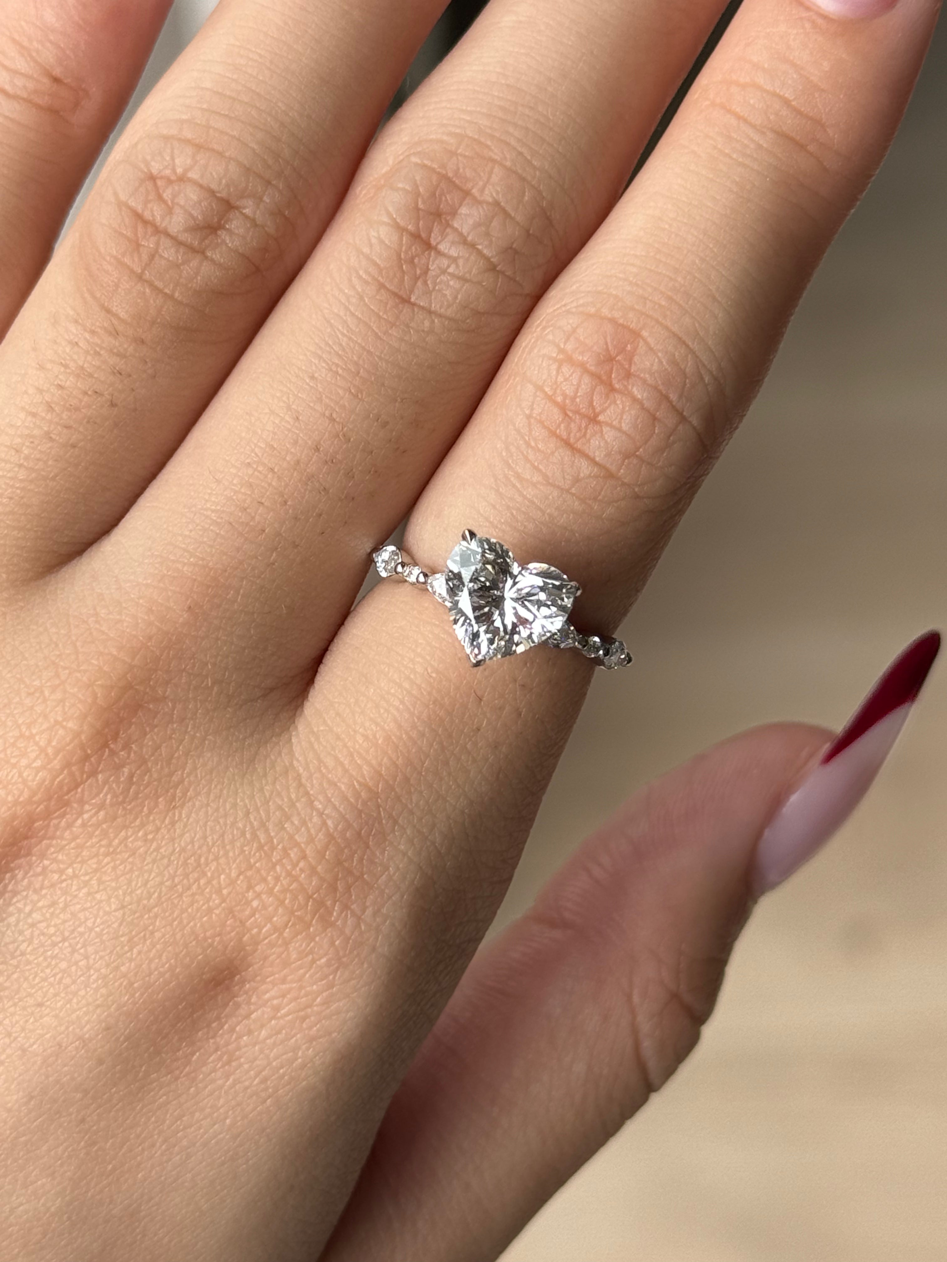 2 carats Heart cut Diamond with Marquise and Round Accent Stone Setting