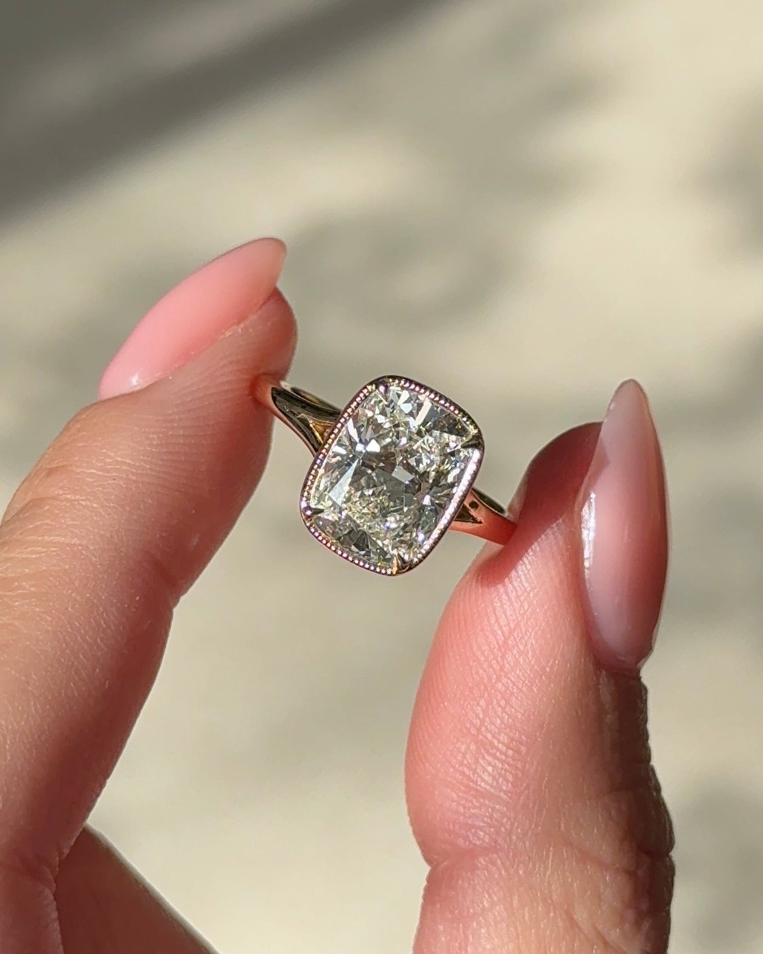 3.10 carats Elongated Cushion cut Tapered band with slim bezel ring