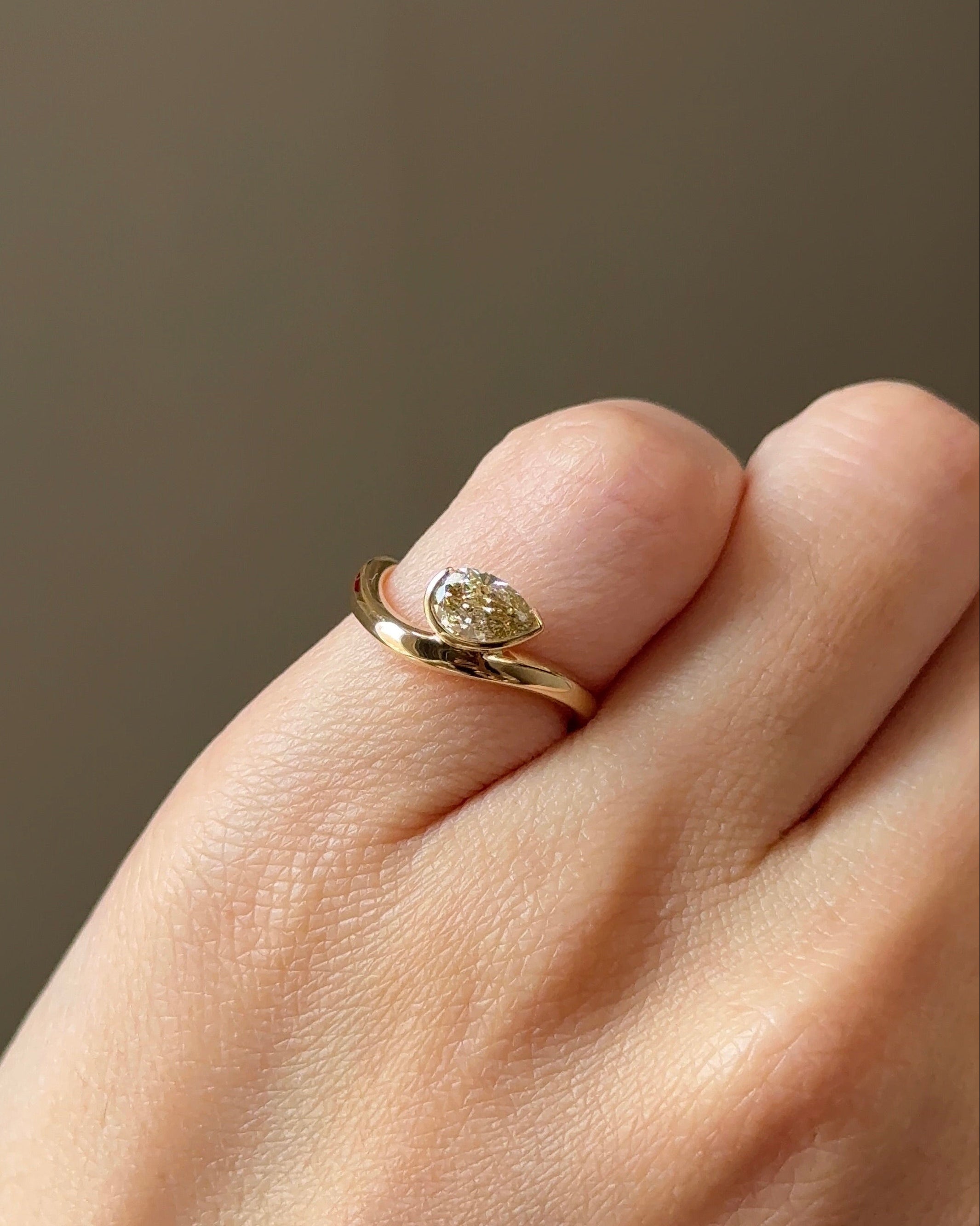 The Reserve 50 Pointer Champagne Pear Cut Diamond with Half Bezel Pinky Ring