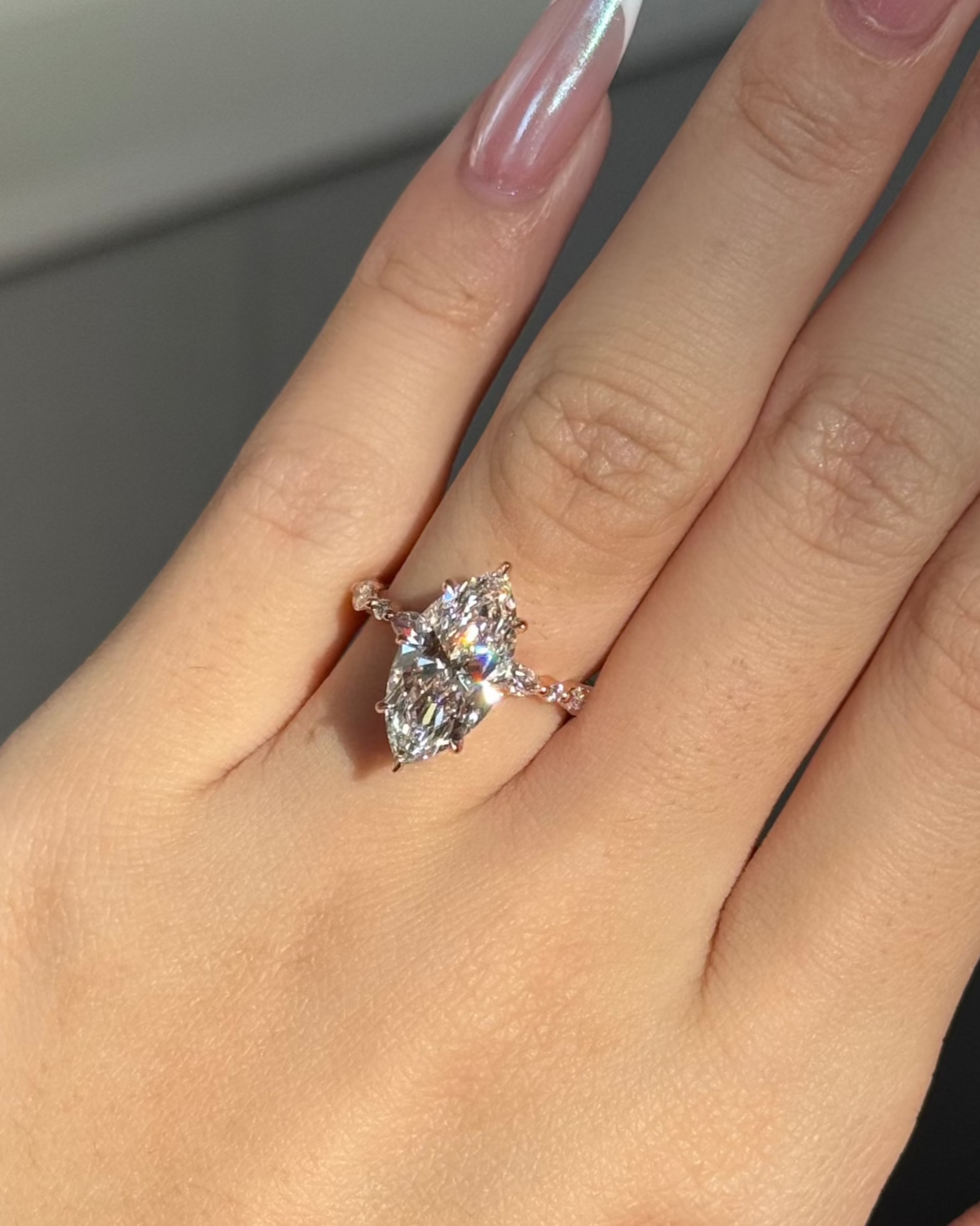 3 carats Marquise Cut Diamond with Round & Marquise Accent Solitaire Ring