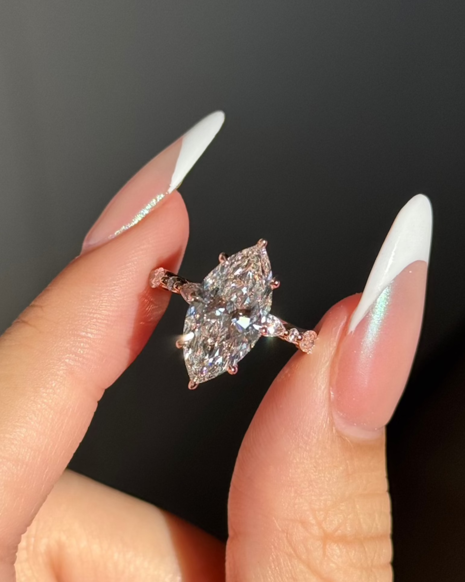 3 carats Marquise with Round and Marquise Accent Stones