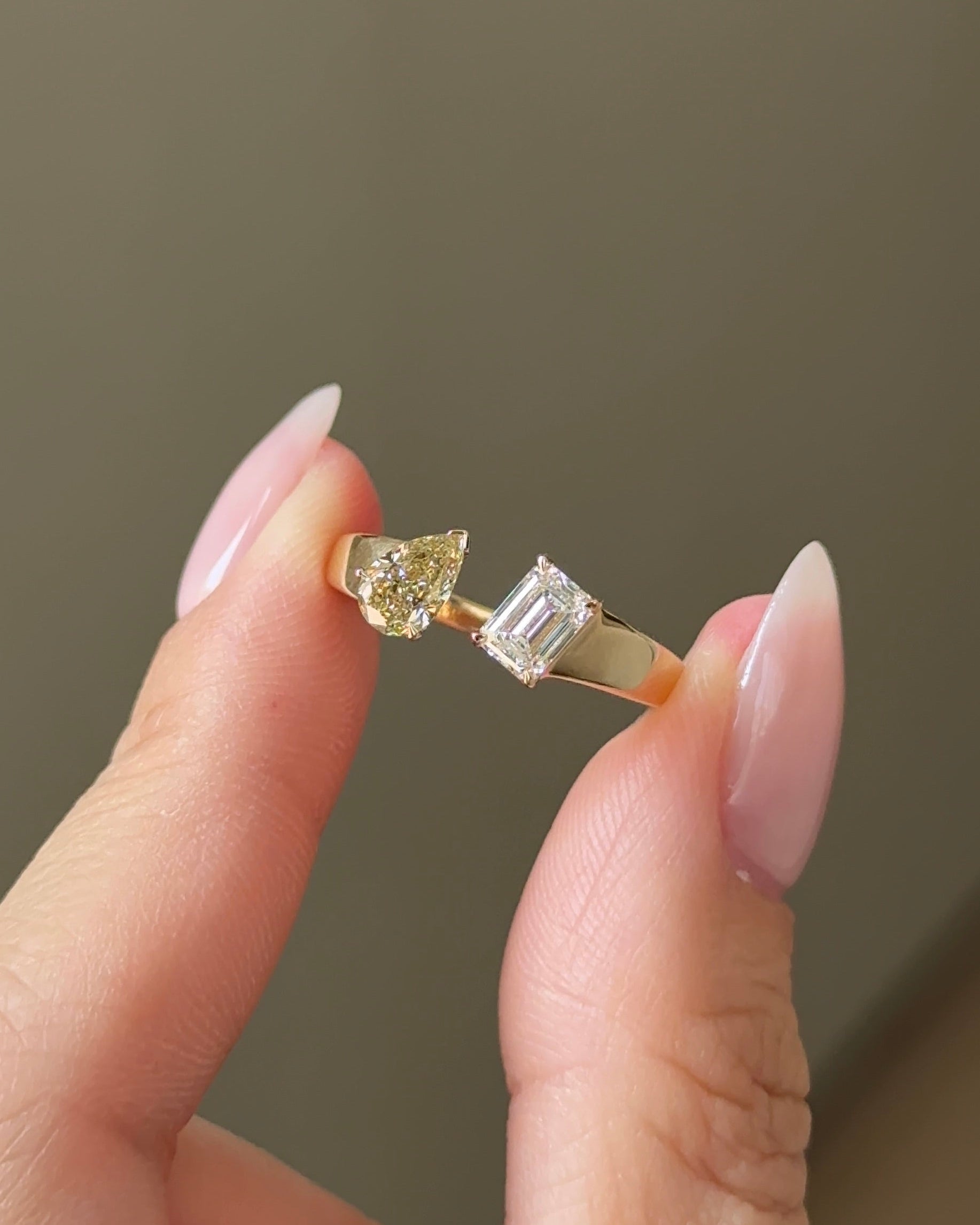 The Reserve 50 Pointer Champagne Pear and 70 Pointer Emerald Cut Diamond with Cigar Band Cuff Ring
