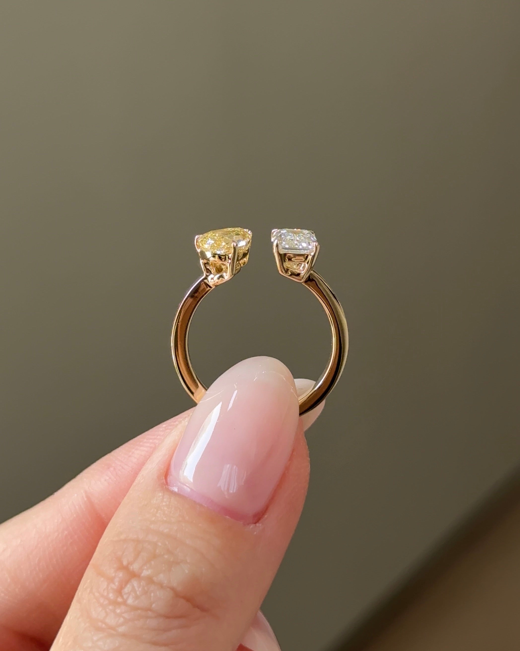 The Reserve 90 Pointer Fancy Yellow Pear and 1 Carat Emerald Cut Diamond Cuff Ring
