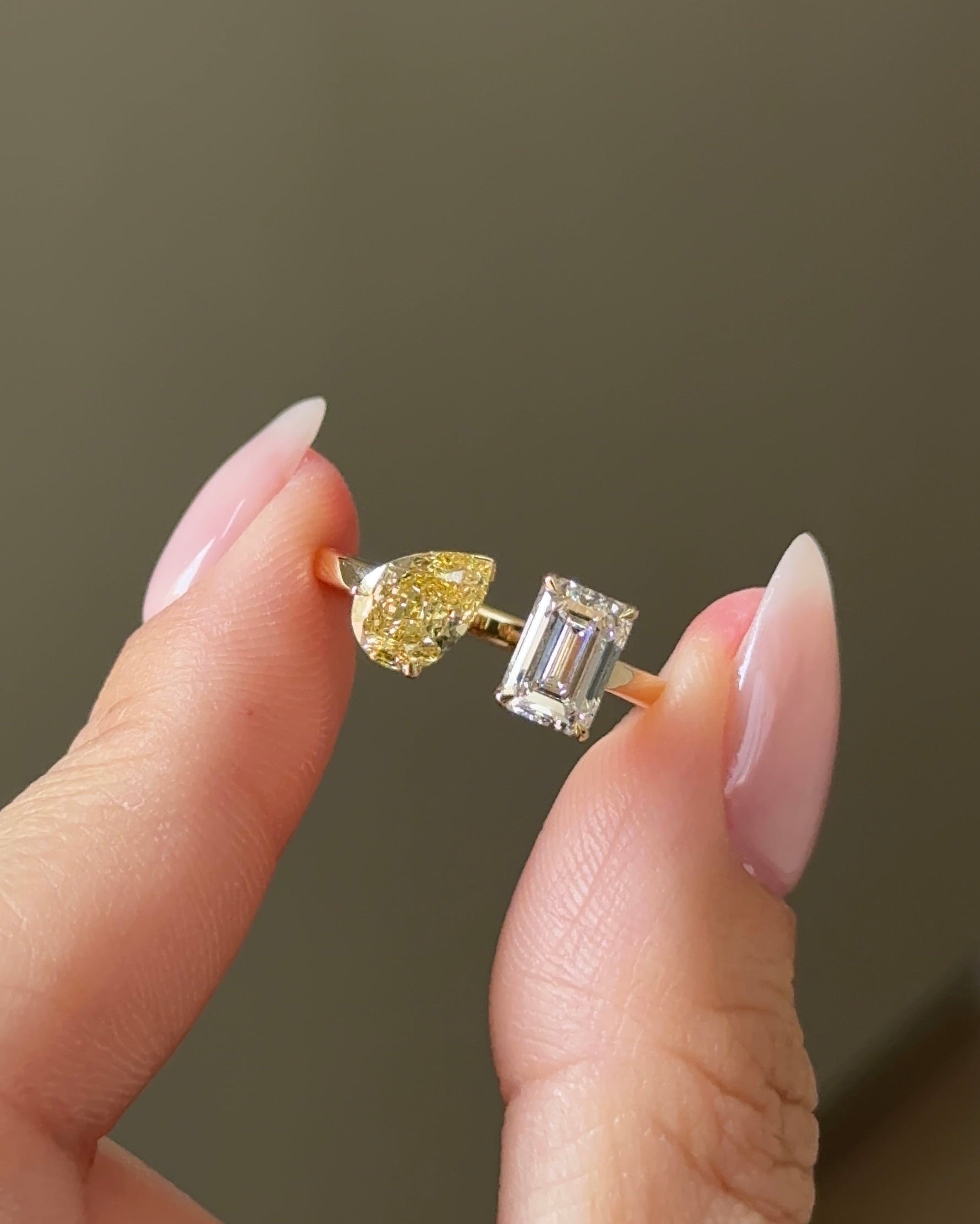 The Reserve 90 Pointer Fancy Yellow Pear and 1 Carat Emerald Cut Diamond Cuff Ring