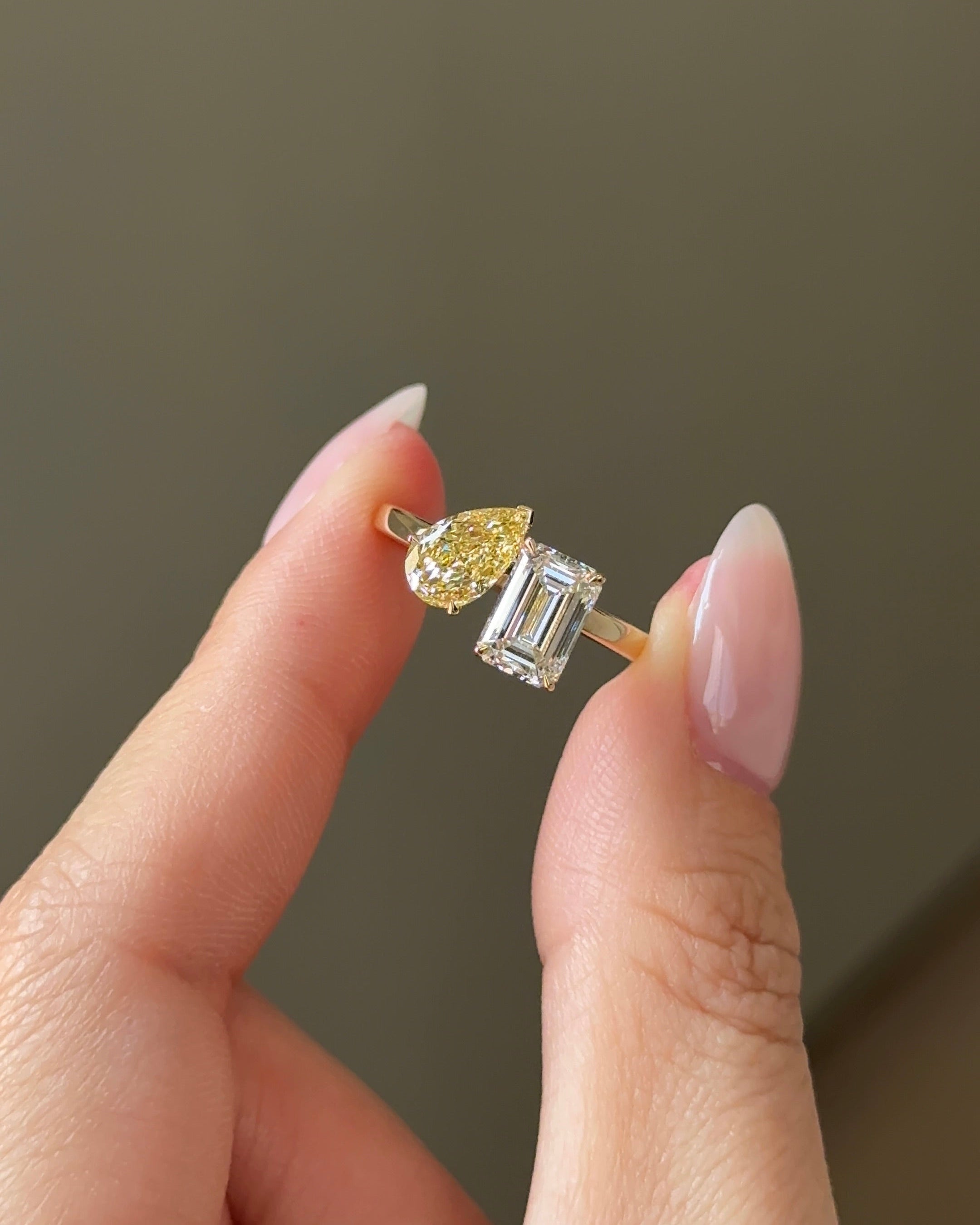 The Reserve 1 Carat Fancy Yellow Pear and 1.5 Carat Emerald Cut Diamond with Cigar Band Cuff Ring