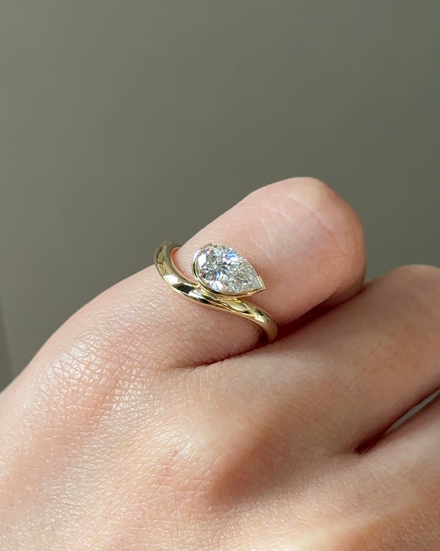 70 Pointer Pear Cut Diamond Bezel Arc Pinky Ring