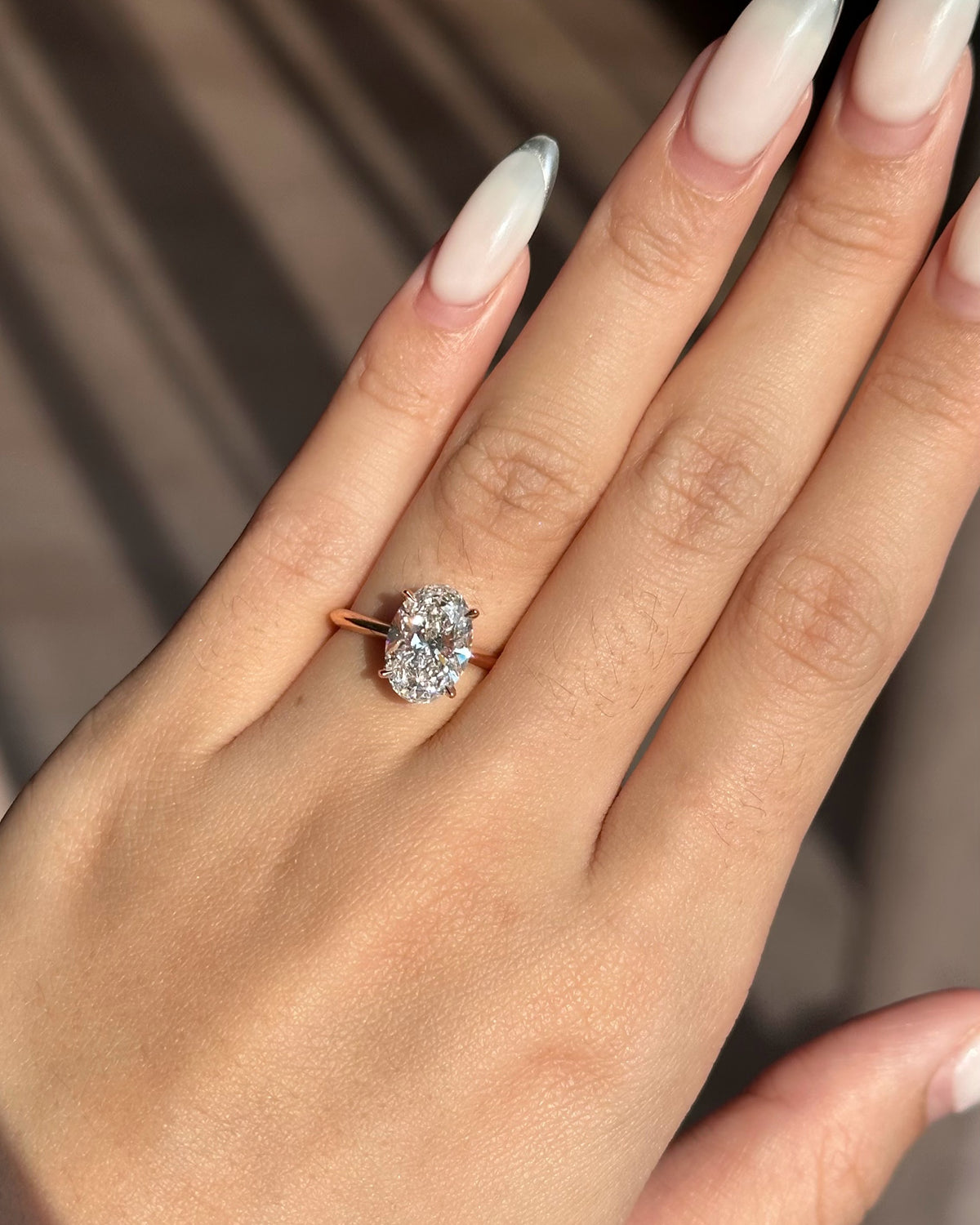 2.5 carats Oval Cut Diamond with Knife Edge Solitaire Ring
