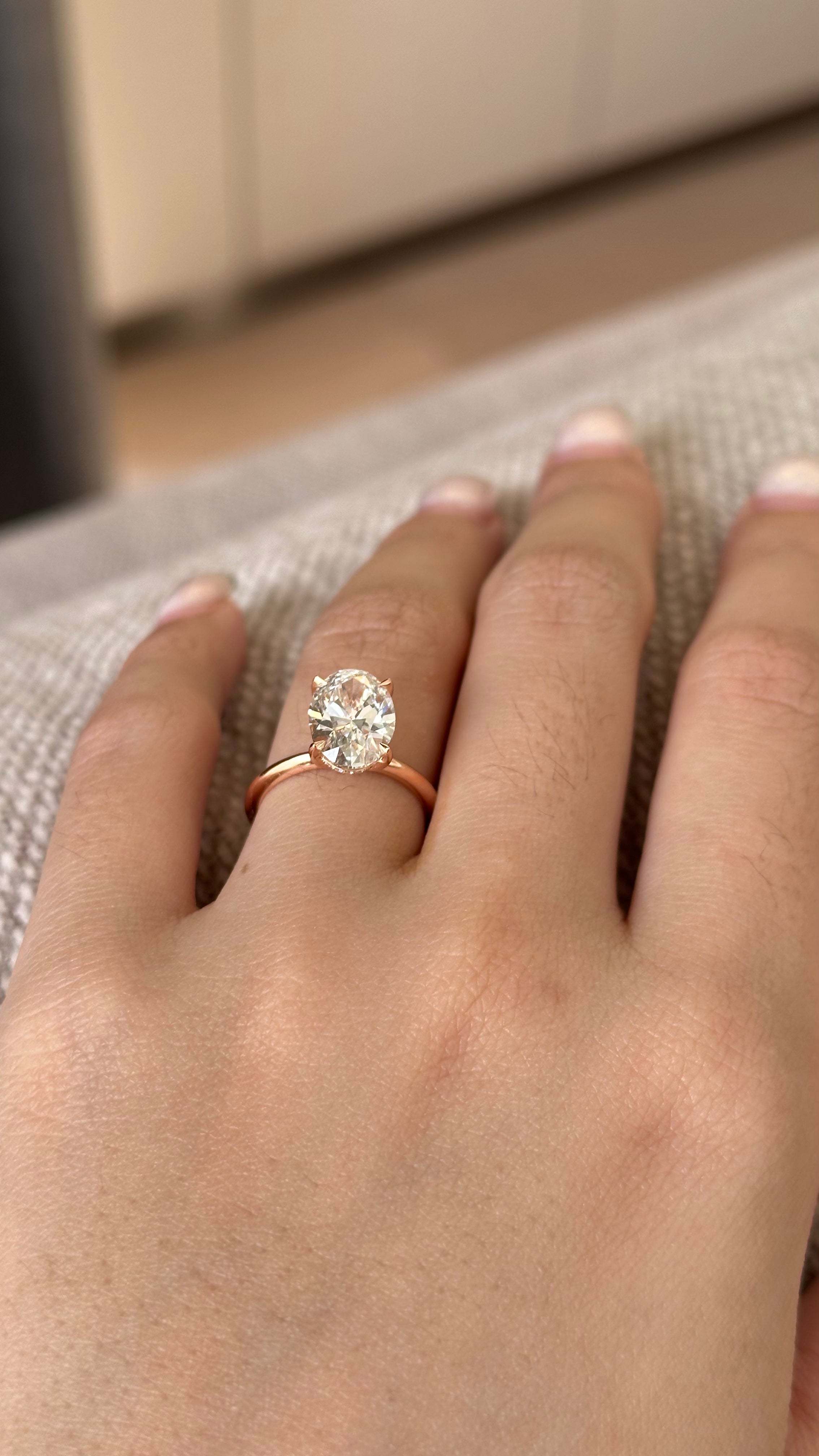 2.5 carats Oval Diamond Cut With Knife Edge Hidden Halo