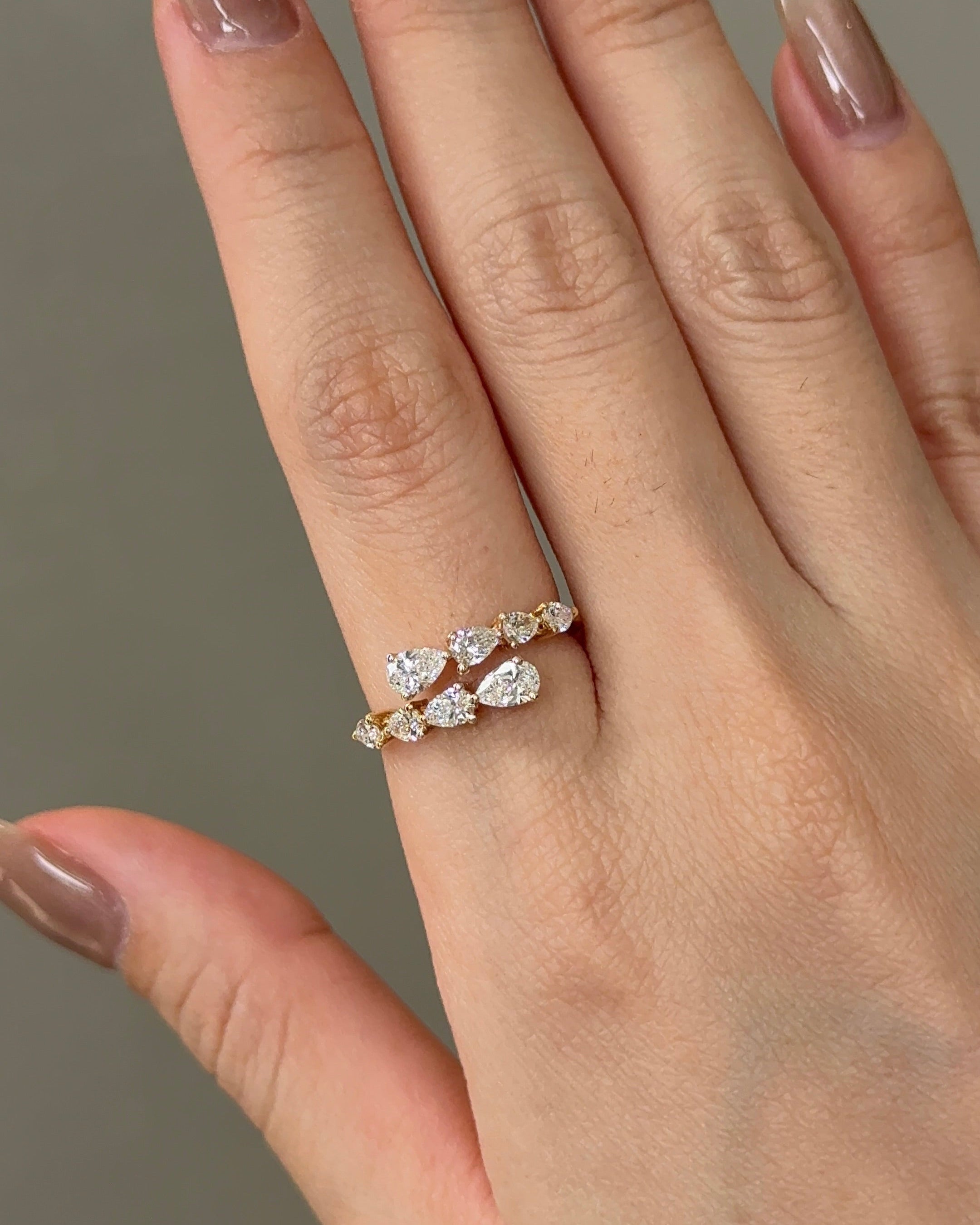 Graduated Pear Cut Diamond Open Ring Yellow Gold