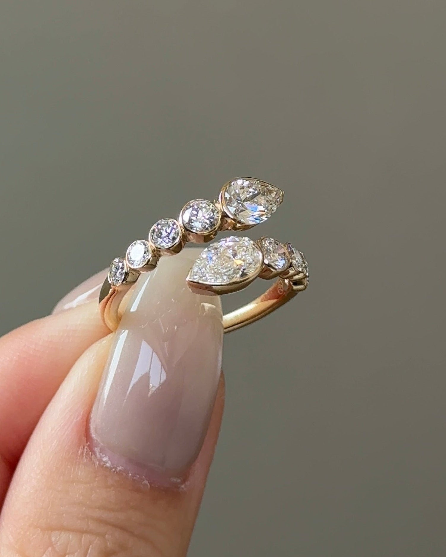 Fang of Fortune Pear Cut Diamond in Petite Bezel Open Ring