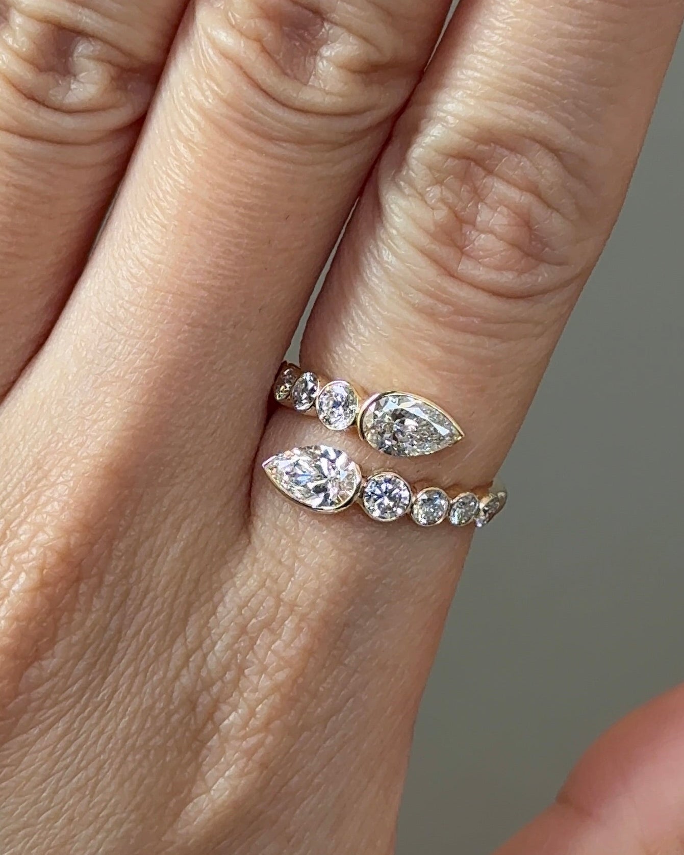 Fang of Fortune Pear Cut Diamond in Petite Bezel Open Ring