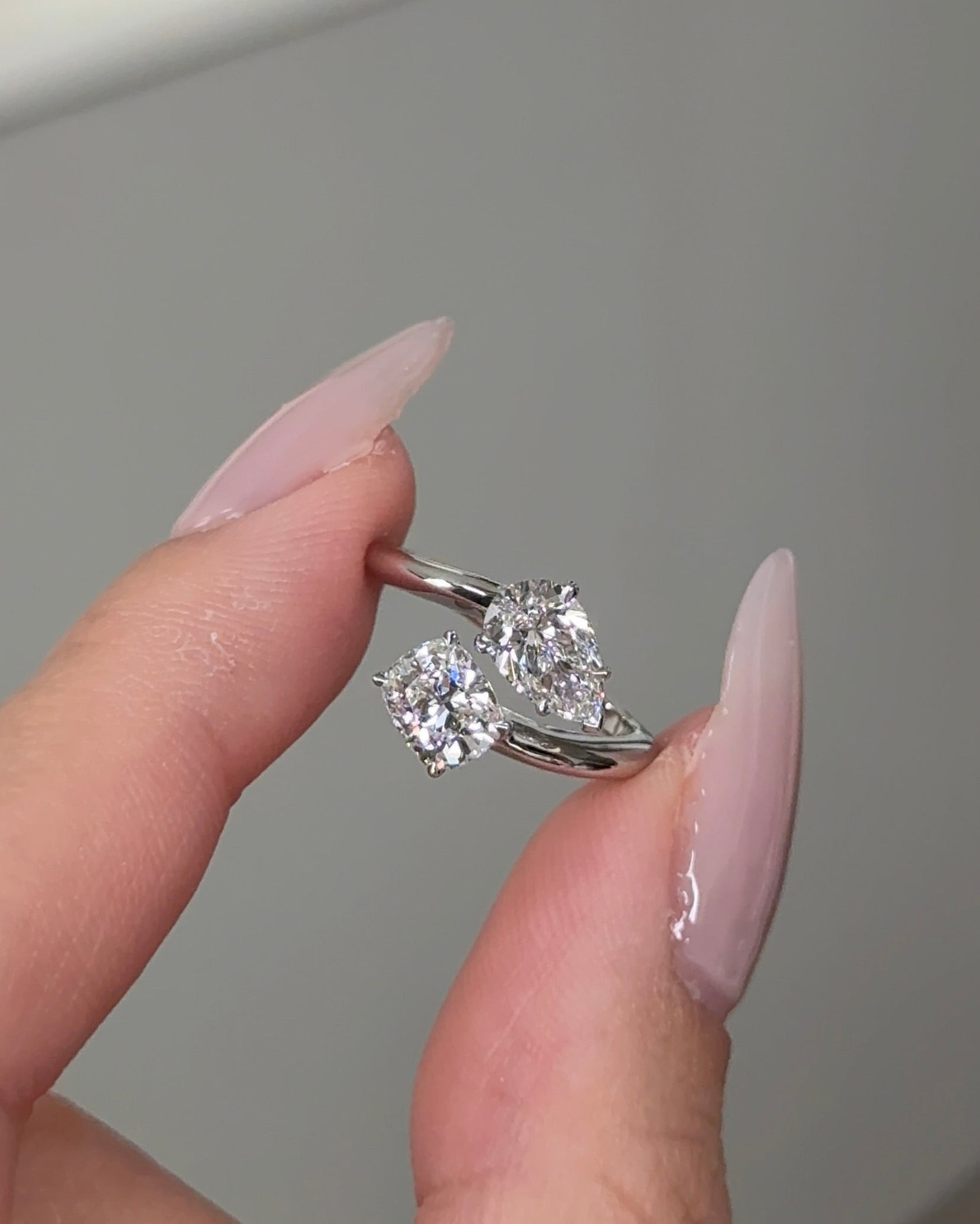 70 Pointer Cushion and Pear cut Diamond Toi Et Moi Ring