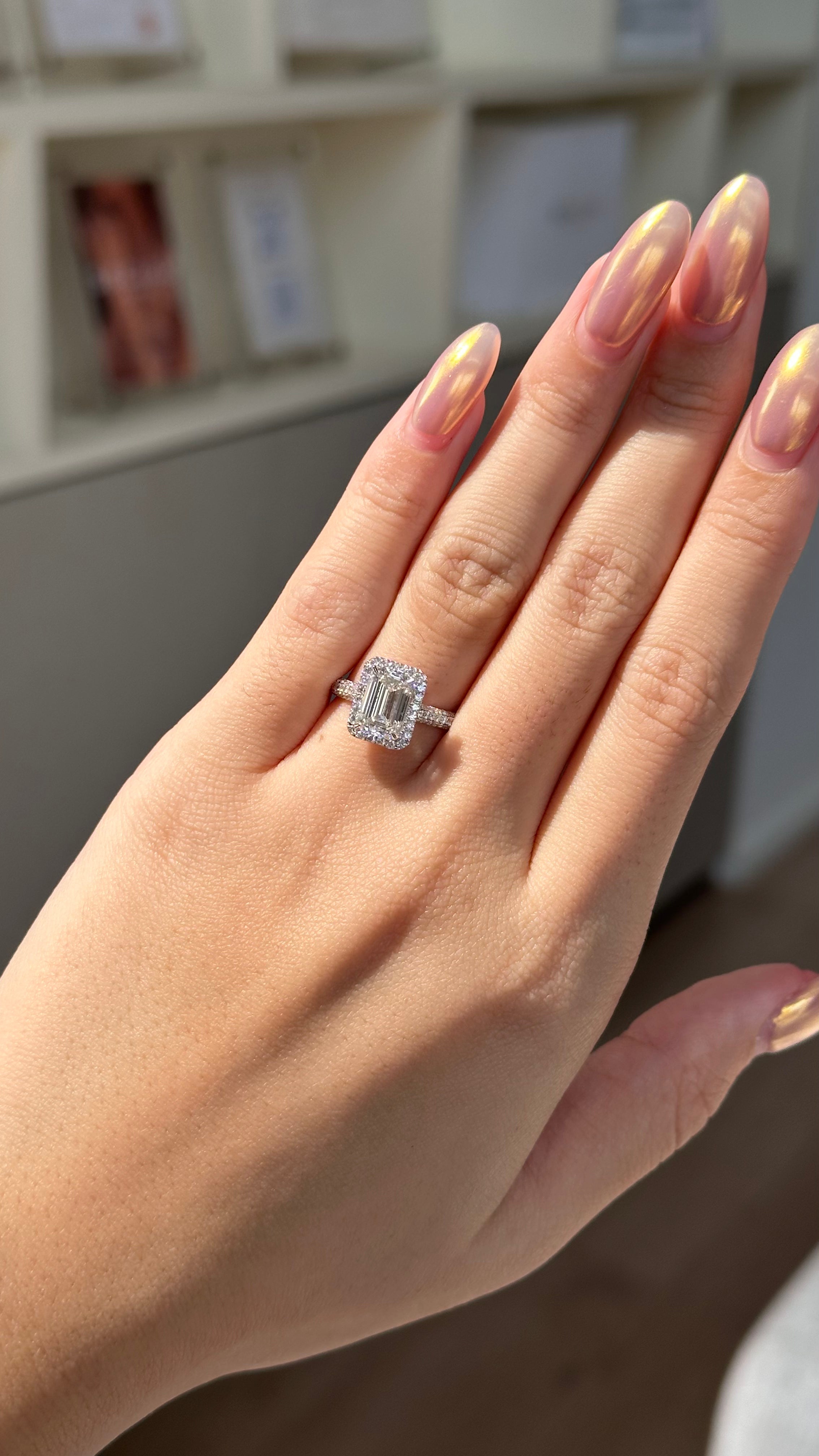 2 carats Emerald cut Diamond with Halo and Glitter Pave setting ring