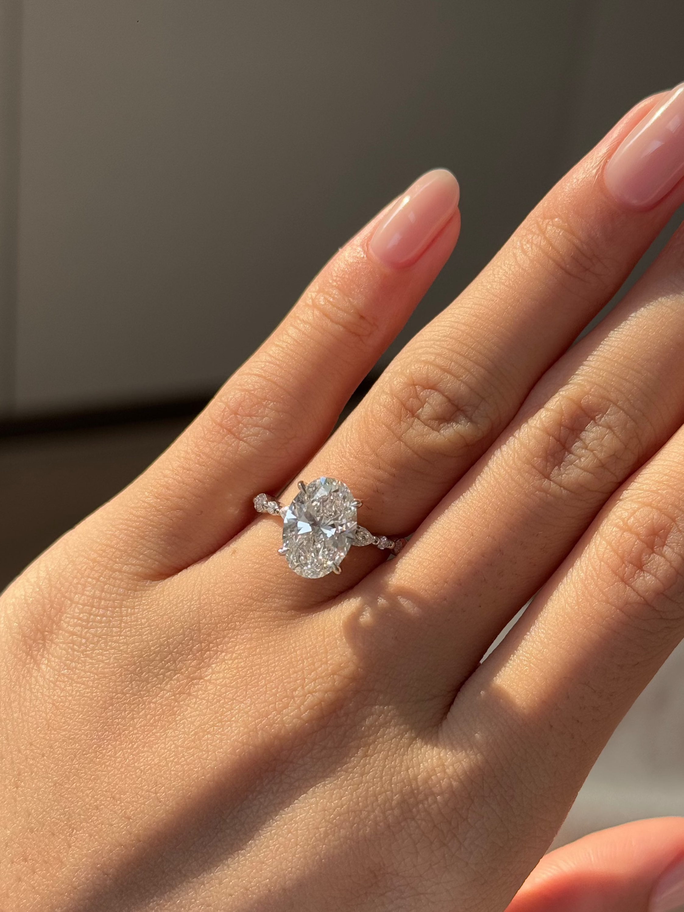 RINA Ring 3 carats Oval Diamond with Marquise and Round Band