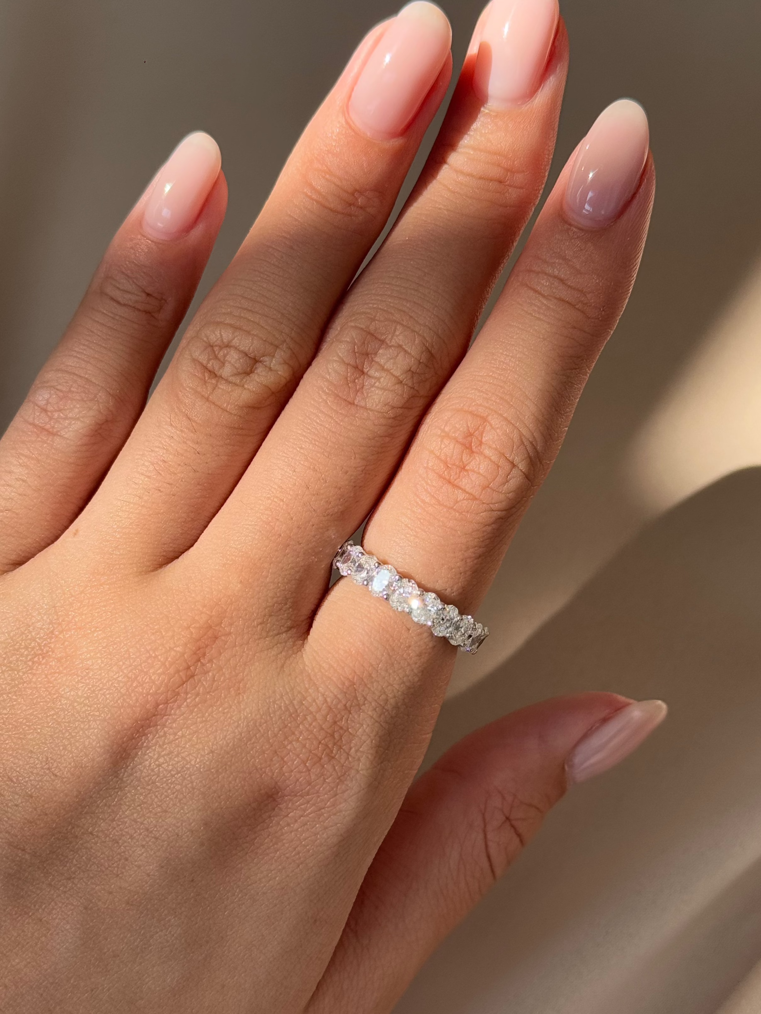 15 Pointer Oval Cut Diamond Half Eternity Ring