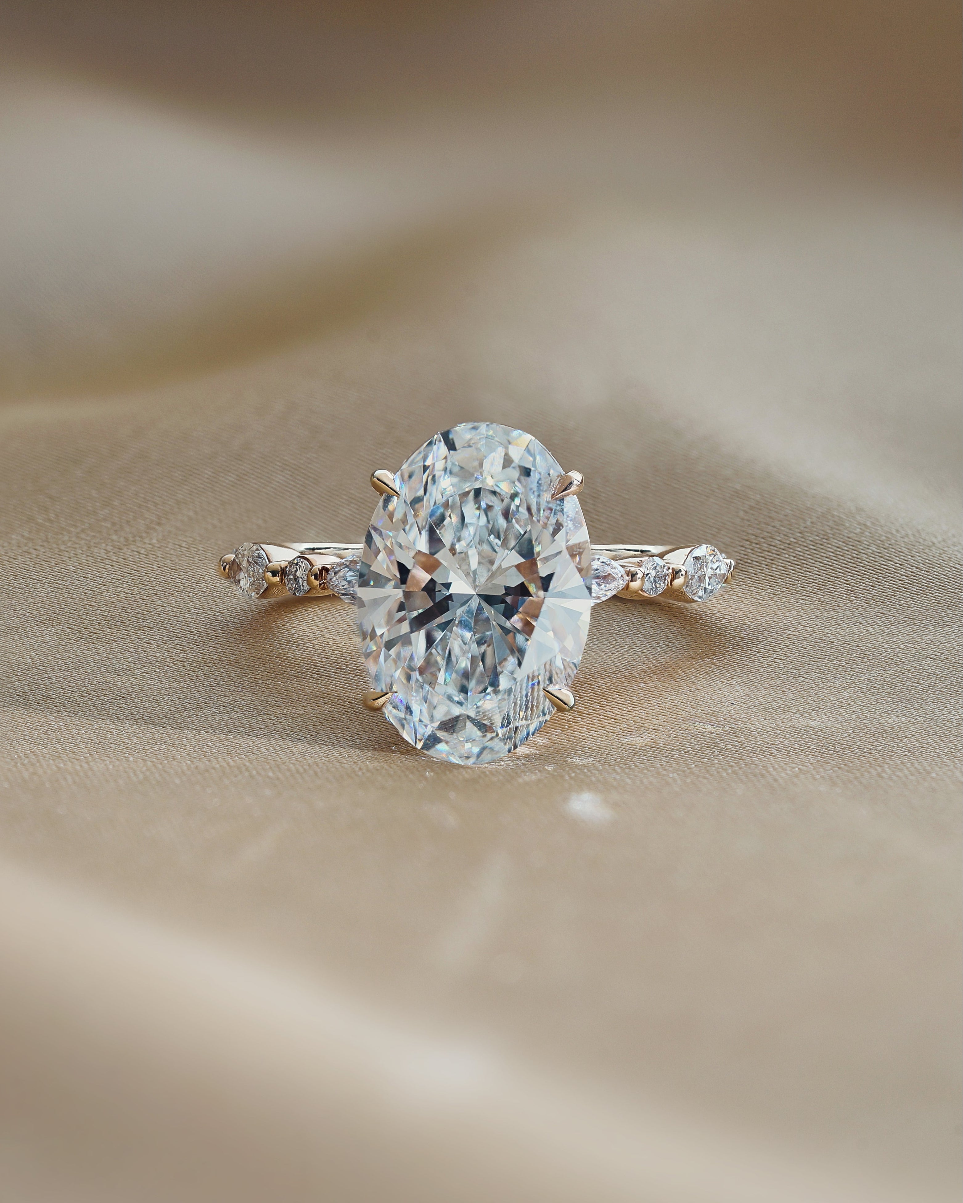 RINA Ring 4 carats Oval Diamond with Marquise and Round Band