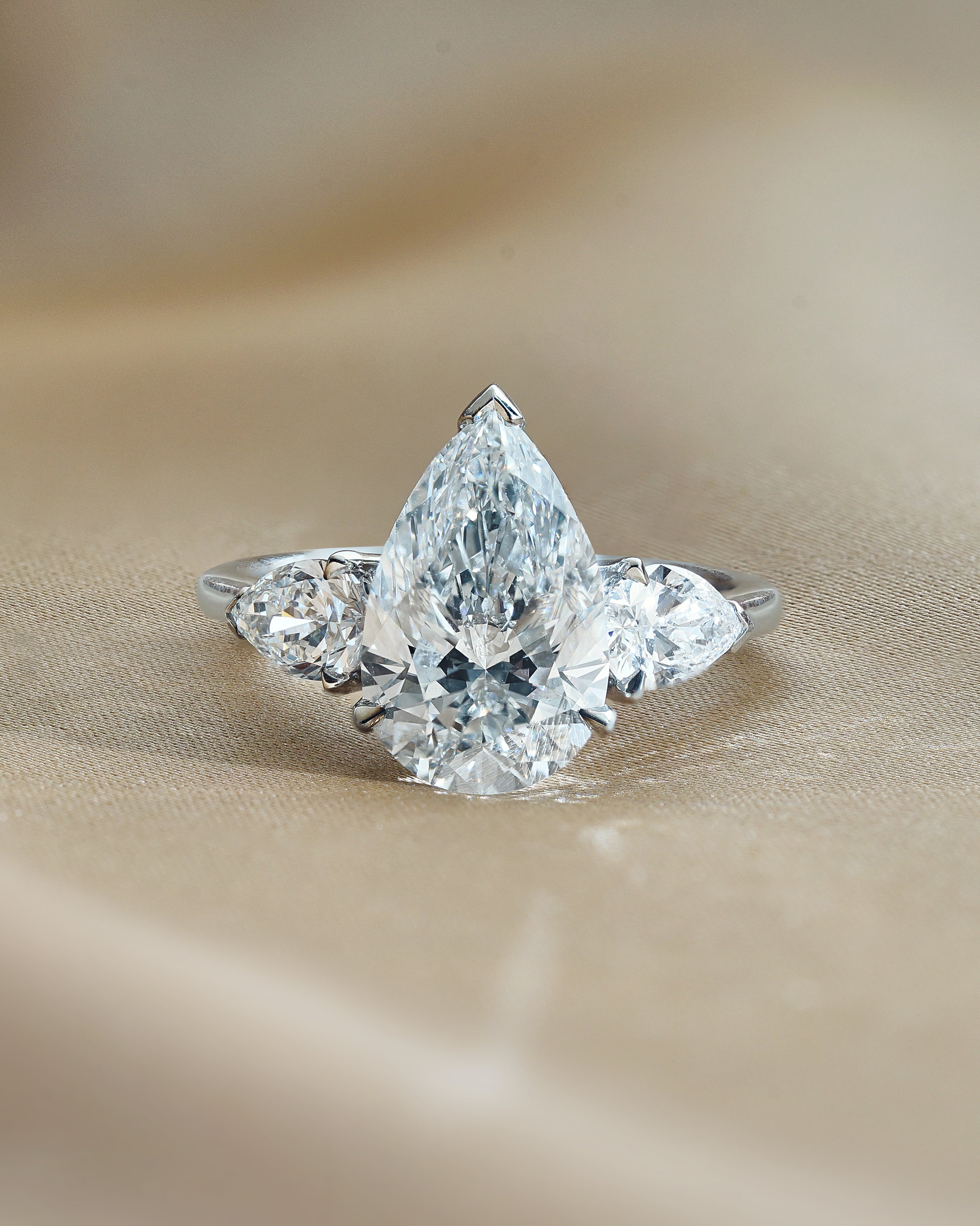 3 Carats Pear Cut Diamond Three-Stone Ring
