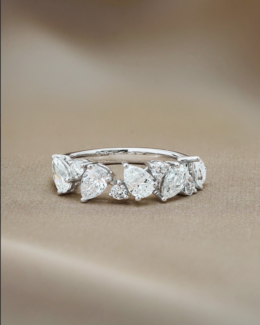 Pear and Round Cut Diamond Ring