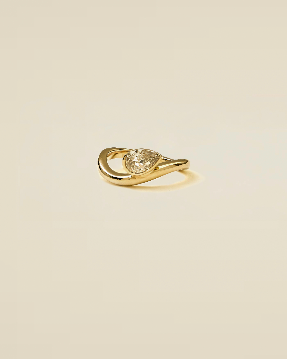 The Reserve 50 Pointer Champagne Pear Cut Diamond with Half Bezel Pinky Ring