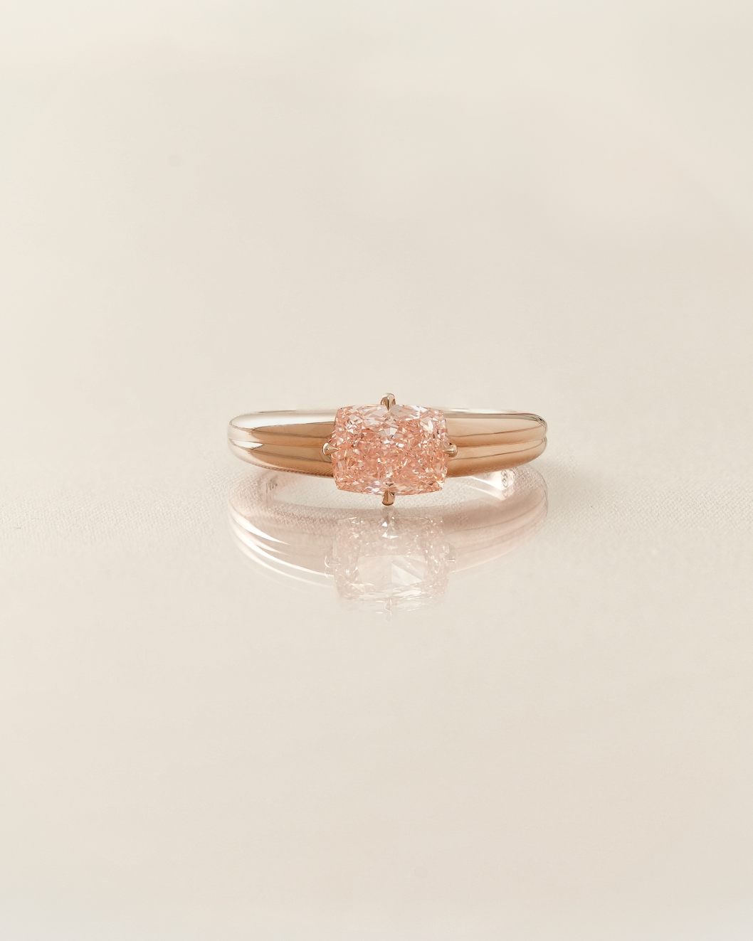The Reserve II 1.76 carats Fancy Vivid Pink Cushion Cut Diamond Compass Setting Tapered Band Solitaire Ring