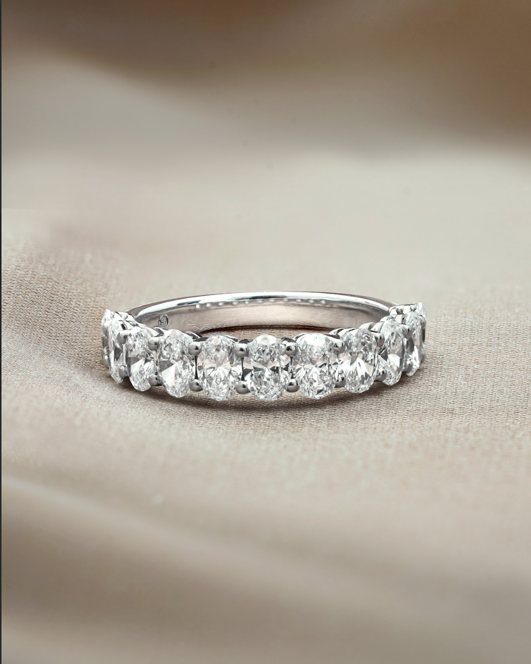 15 Pointer Oval Cut Diamond Half Eternity Ring