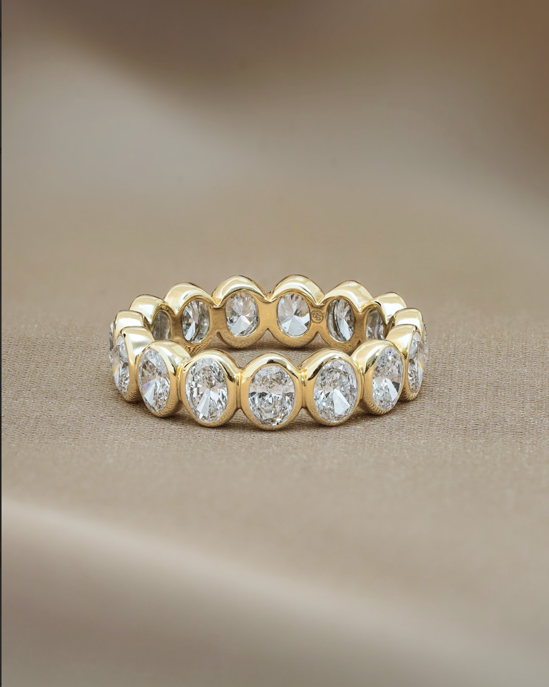 30 pointer Oval Cut Diamond in Bezel Setting Full Eternity Ring