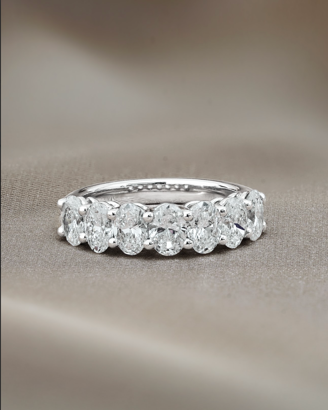 30 pointer Oval Cut Diamond Half Eternity Ring