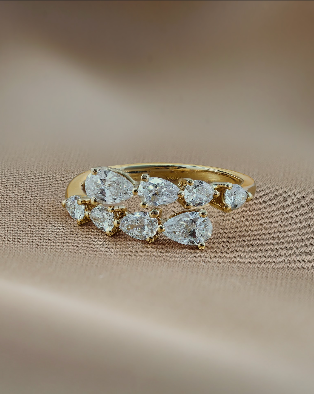 Graduated Pear Cut Diamond Open Ring Yellow Gold