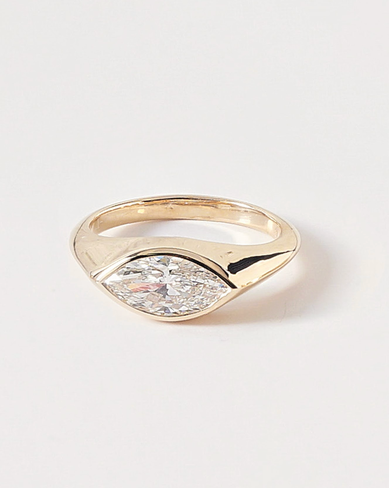 1 carats Marquise Cut Diamond Side way Bezel Setting