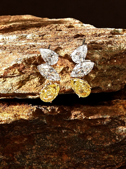 The Reserve 1 Carat Fancy Yellow Pear Cut Diamond Droplet + Toi Et Moi 50 pointer Pear and Marquise Cut Stud Earrings